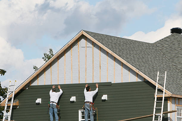 Professional Storm Damage Siding Repair technician working in Quantico, VA